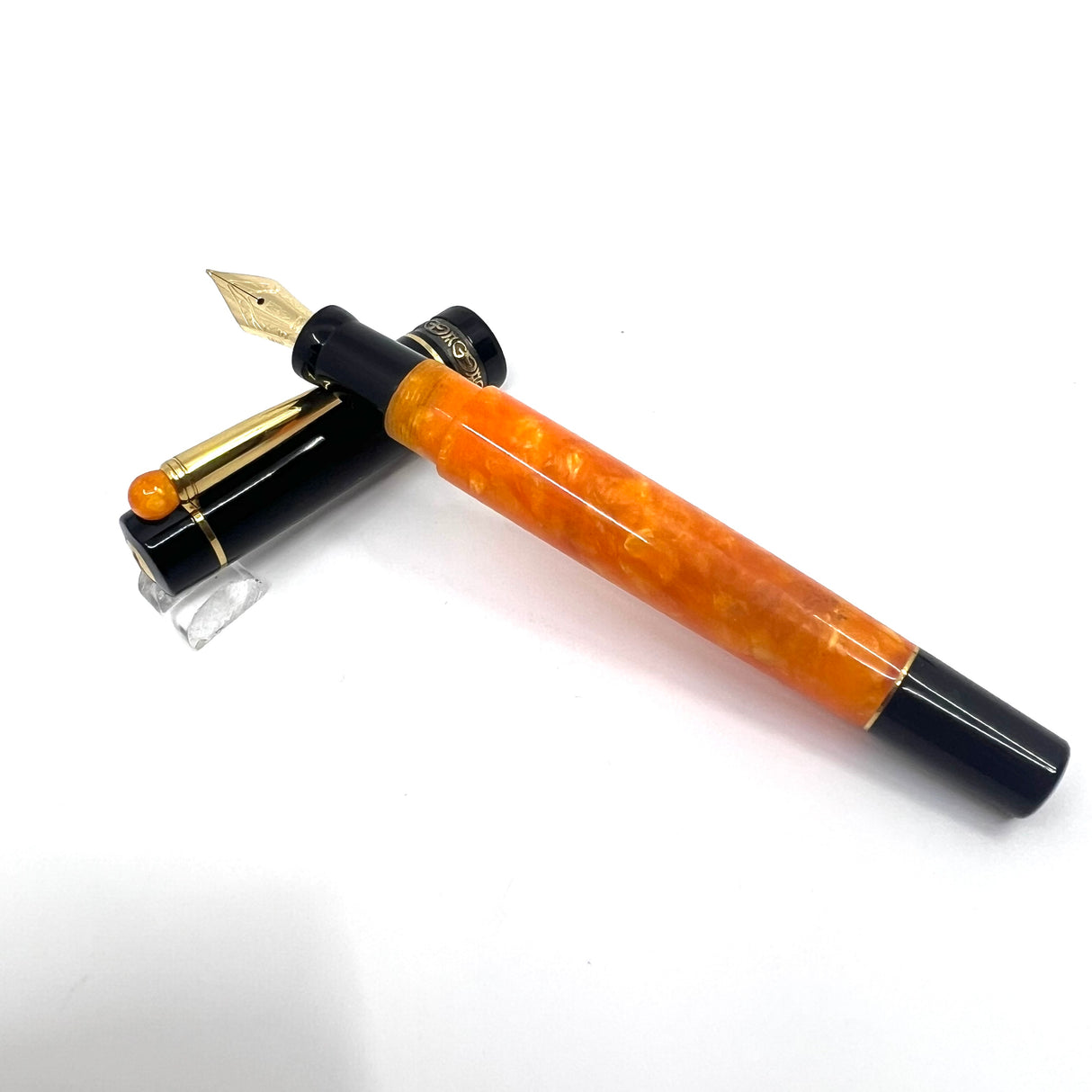 Delta Lucky Black/Orange Fountain Pen (aka WE)- Medium 14kt Gold Nib