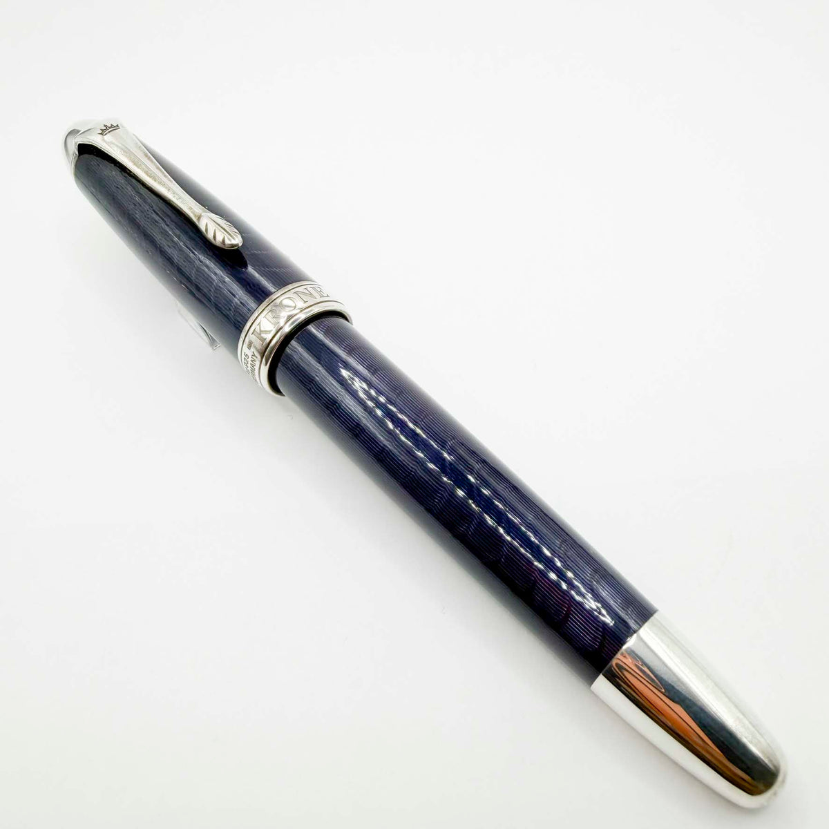 Krone Heavy Sterling Silver Oversized Fountain Pen - Translucent Dark Blue Enamel overlaying the Sterling Silver Body of Guilloched Wave Design - Medium 18kt Gold Nib