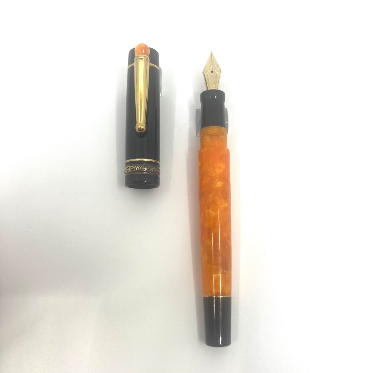 Delta Lucky Black/Orange Fountain Pen (aka WE)-  Medium 14kt Gold Nib