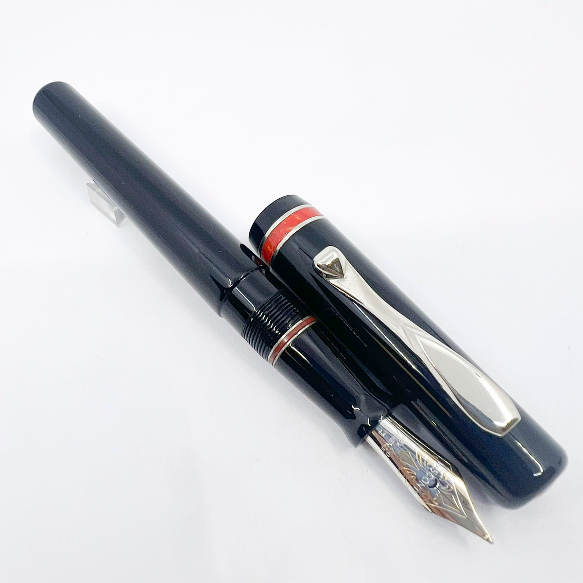 Visconti Glossy Black Resin Midnight Voyager Fountain  Pen - Two Rings of Coral Celluloid - Broad 18kt Gold Nib