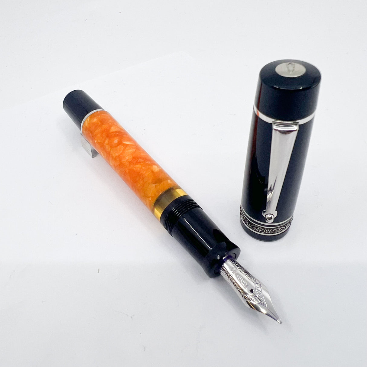 Delta  DolceVita Mid-Size, Piston Fill .925 Sterling Silver Trim Fountain Pen -  Broad 14kt Gold Nib